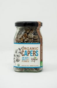 Capers in sea salt, carefully packed and sustainably harvested by Ishka Farms.