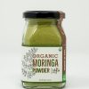 Organic moringa powder in a jar from Ishka Farms
