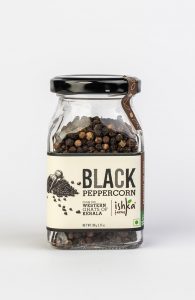 Small glass jar of organically grown black peppercorns from Ishka Farms